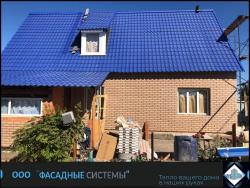Оранжевый фасад выполненный из фиброцементных термопанелей