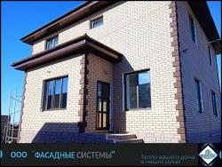 Фасад из оранжевых термопанелей
