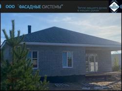 Дом с наружной отделкой из термопанелей из бетона
