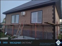 Фасад утепленный термопанелями из бетона под кирпич в оранжевых тонах