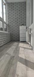 Лоджия из фиброцементных фасадных термопанелей в сером цвете