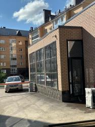 Высокий дом из термопанелей под камень цвет оранжевый