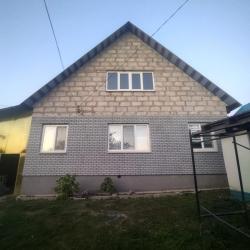 Процесс монтажа термопанелей из фибробетона под кирпич
